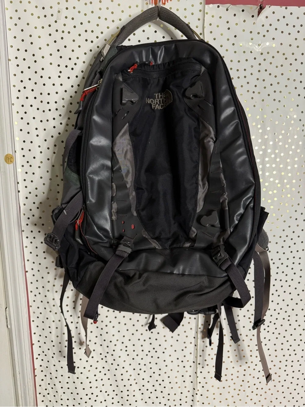 The North Face Black and Gray Men's Backpack with Red Accents